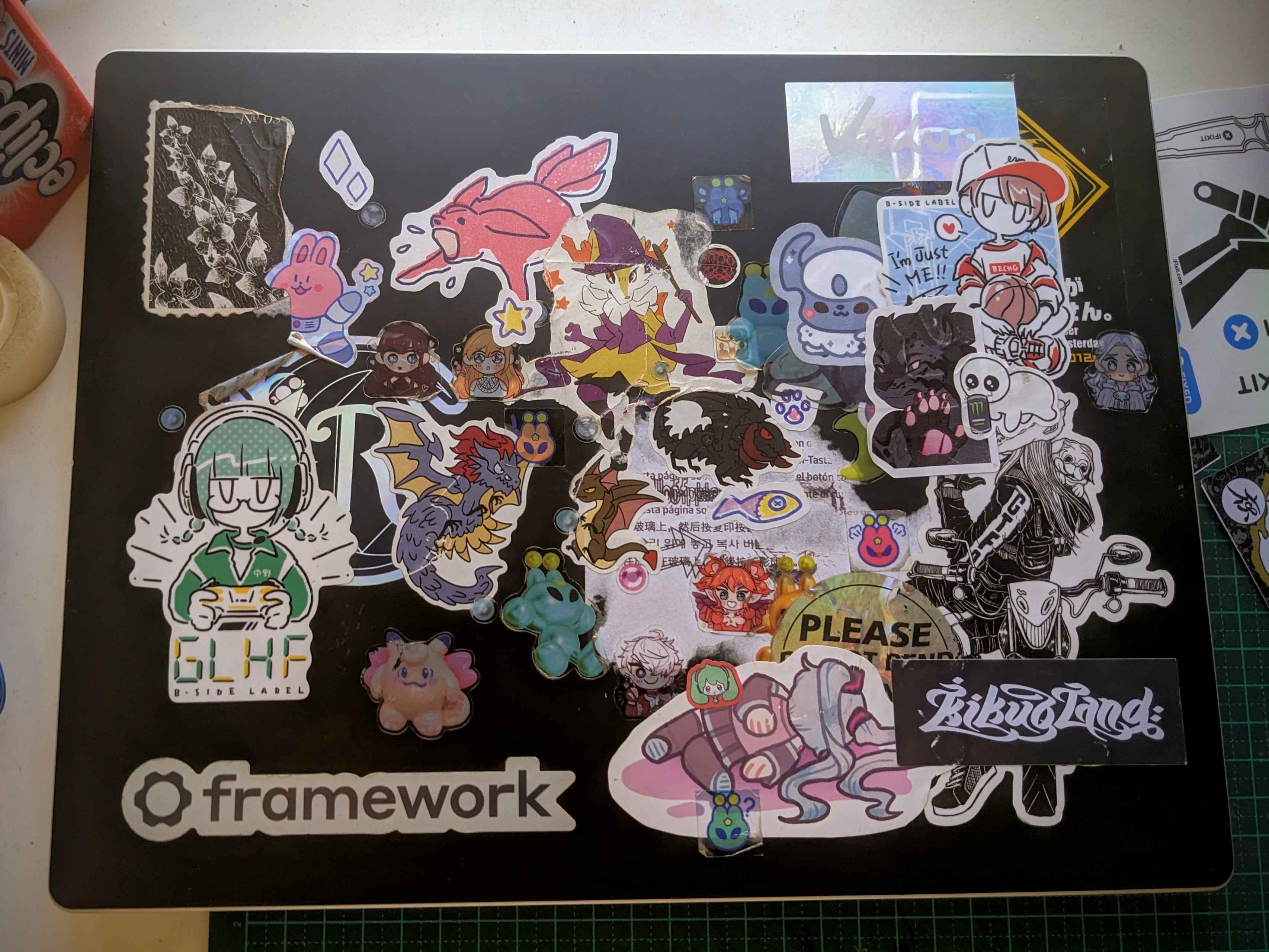 a framework 13 laptop covered in stickers a framework 13 laptop covered in stickers