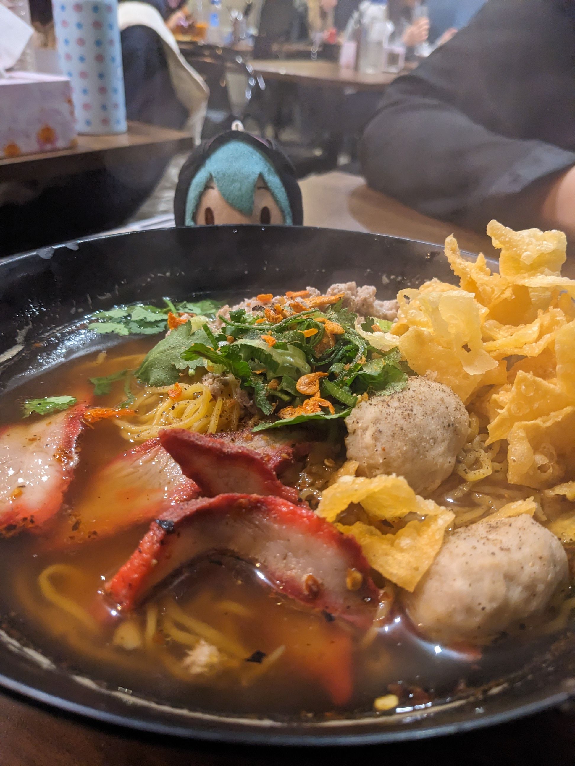 miku plushie behind massive bowl of sukho thai miku plushie behind massive bowl of sukho thai