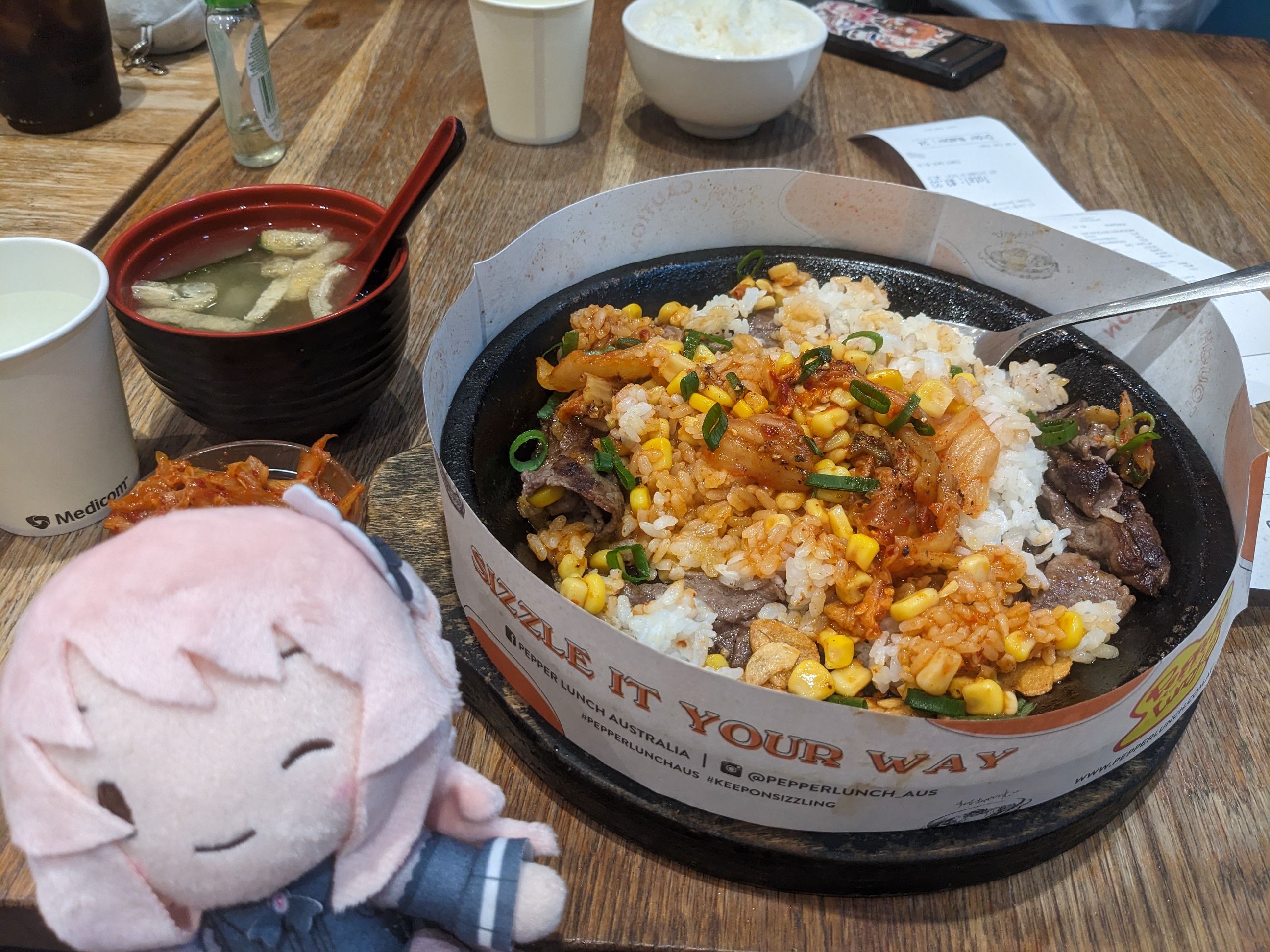 photo of my gifted mizuki nui in front of a pepper lunch meal