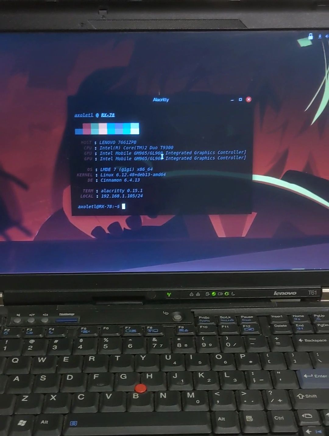 photo of my thinkpad booted into lmde 7 with an alacritty terminal showing fastfetch